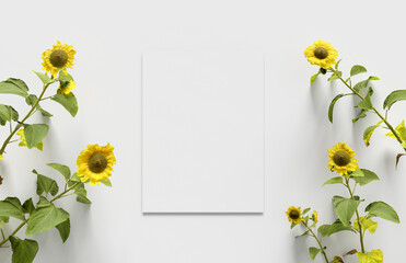 Top view of a white card mockup with branch of sunflower on white background