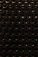 Obraz premium Area of stacked wine bottles in wine cellar, South Moravia Czech Republic
