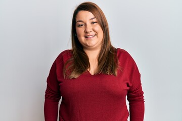 Beautiful brunette plus size woman wearing casual clothes with a happy and cool smile on face. lucky person.