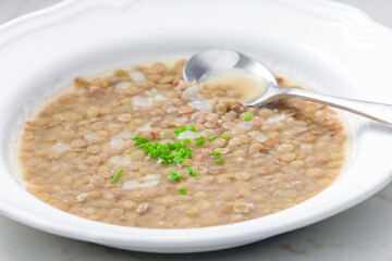 lentil soup with whte onion and chive