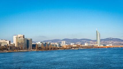 Fototapeta premium Vienna Danube and 2nd district on a beautiful day with blue sky.
