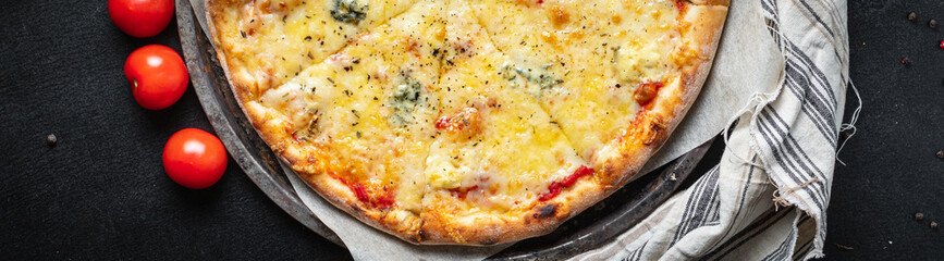 cheesy pizza several types of cheese fast food and other ingredients portion on the table healthy meal snack outdoor top view copy space for text food background rustic image