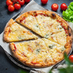 cheesy pizza several types of cheese fast food and other ingredients portion on the table healthy meal snack outdoor top view copy space for text food background rustic image