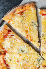 cheesy pizza several types of cheese fast food and other ingredients portion on the table healthy meal snack outdoor top view copy space for text food background rustic image