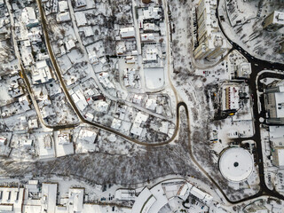 Obraz premium Snowy Kiev. Aerial drone view. Winter sunny morning.
