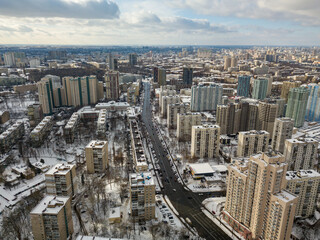 Snowy Kiev. Aerial drone view. Winter sunny morning.