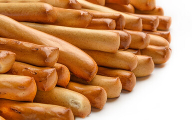 Bread sticks close up isolated on white. Fresh baked goods.