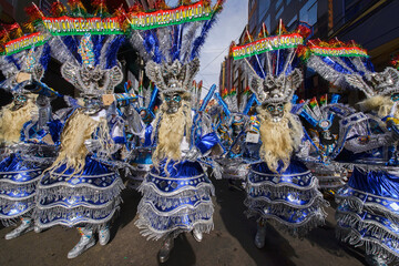 Masked dancers at the Gran Poder Festival, La Paz, Bolivia - obrazy, fototapety, plakaty