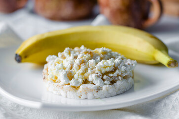 Sandwich with cottage cheese, honey and banana on a diet bread