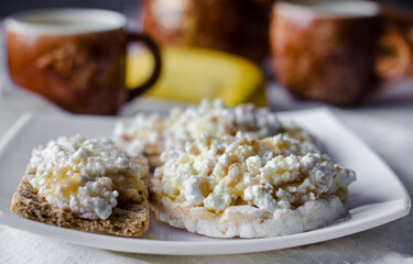Sandwich with cottage cheese, honey and banana on a diet bread