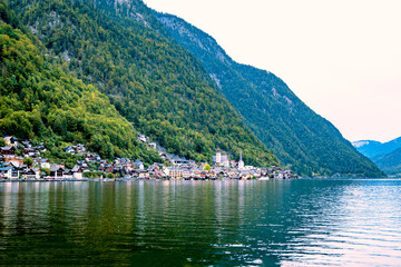 Fototapeta na wymiar A picturesque town on the shore of a mountain lake. tourist