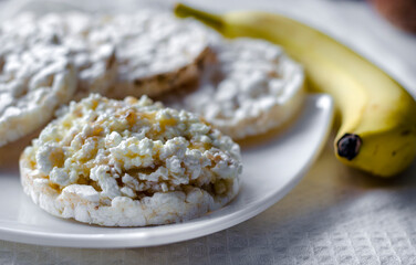 Sandwich with cottage cheese, honey and banana on a diet bread