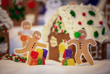 Funny Diorama of Two Gingerbread People having a Gumdrop Fight in Front of a Gingerbread Village