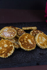 Freshly cooked sugared welshcakes, copyspace, portrait.