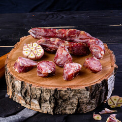 Homemade sausages in a traditional smoker smoked sausage. Traditional food. Smoked sausages meat In Smokehouse. homemade rustic sausage