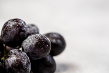 Fresh grapes on a light background - healthy living