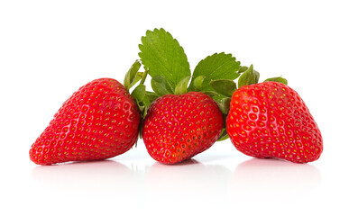 Three fresh strawberries isolated
