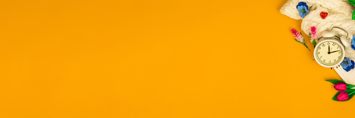 Banner March 8 yellow background, spring holidays, decorative flowers, workplace or workspace, flat lay desk and table, copy space