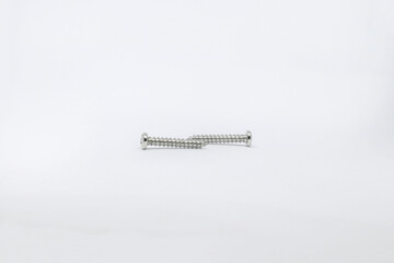 Photo shoot of screws on white background. Variety of screws. Product photos.