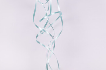 blue ribbon is randomly intertwined
