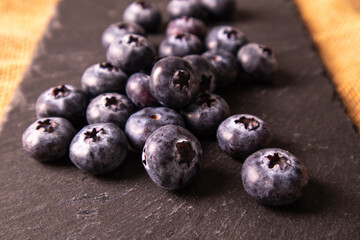 Raw organic blueberries in a Bunch close up