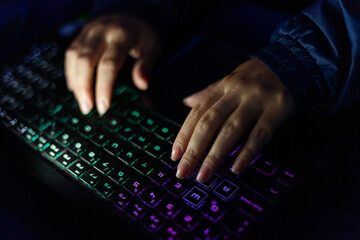 person typing on a keyboard