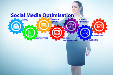 Social media optimisation concept with businesswoman