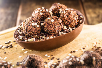 brazilian easter egg stuffed with granulated chocolate and cream, tasted with a spoon. Easter tradition in Brazil
