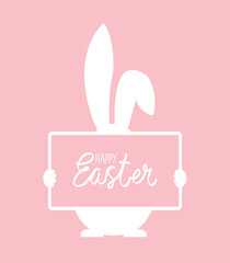 Easter bunny is holding a sign with a greeting at pink background.