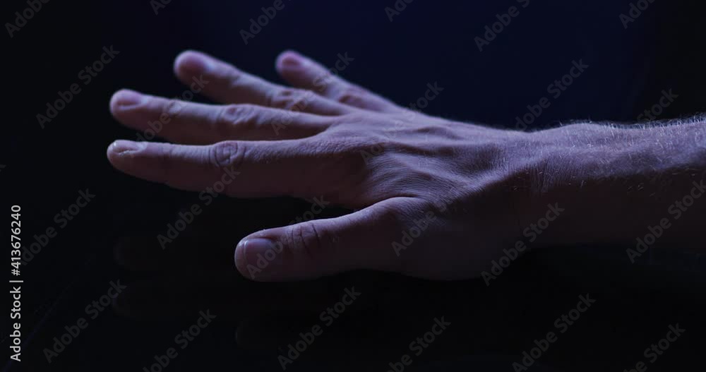 Poster hand of caucasian man using digital interface placing palm down on touchscreen