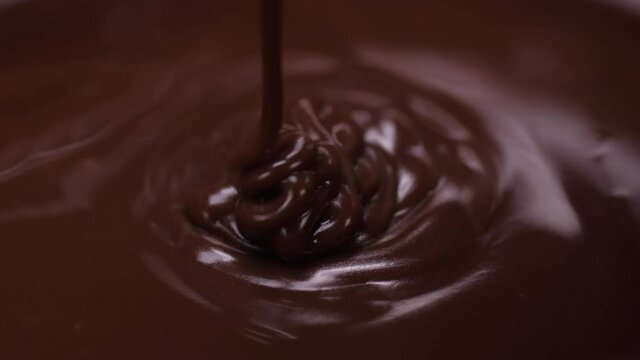 pouring melted chocolate 4k
