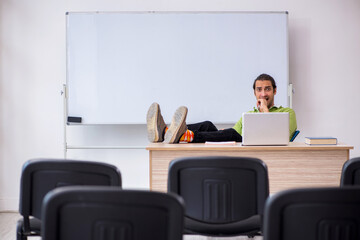 Young male student in business presentation concept