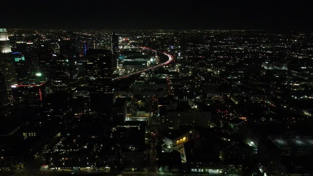 Downtown Los Angeles California at Night Aerial with Freeway Traffic