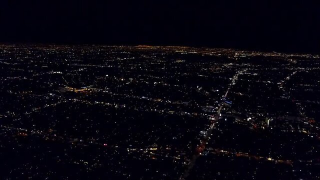Large Metropolitan area at night with bright lights 