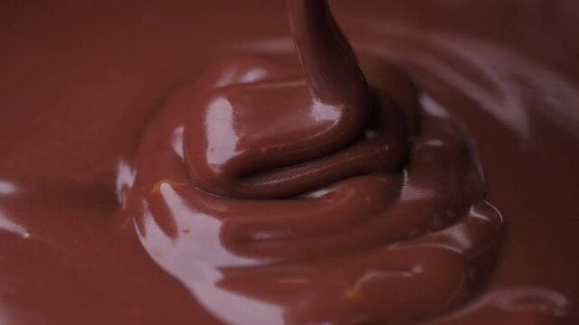 pouring melted chocolate 4k