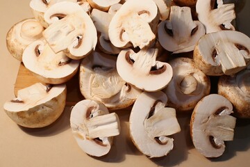 Fresh mushrooms of large size for cooking on a wooden board view from above
