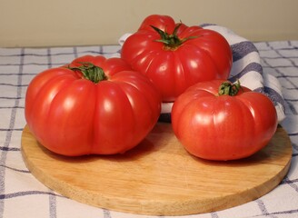 tomatoes on a wooden table