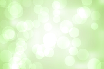 Abstract illustration of bokeh spots of light against green background