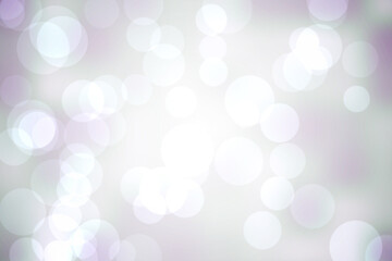 Abstract illustration of bokeh spots of light against purple background