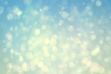 Abstract illustration of bokeh spots of light against blue background