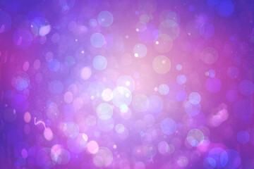 Abstract illustration of bokeh spots of light against blue and purple gradient background