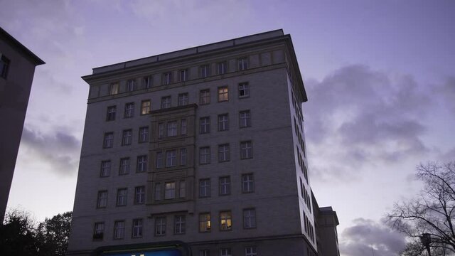 Gliding upwards shot of vintage Building during magic hour in Berlin Friedrichshain