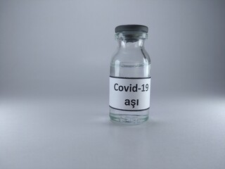 Covid 19 vaccine written in Turkish language on a vaccine bottle 