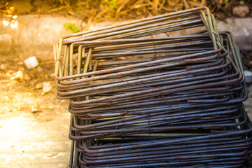 Construction worker Making Reinforcement steel rod and deformed bar with rebar at construction site.