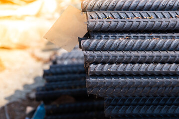 Construction worker Making Reinforcement steel rod and deformed bar with rebar at construction site.