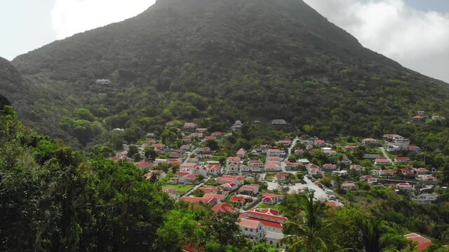 Aerial slow motion footage of Windwardside on the Caribbean island of Saba