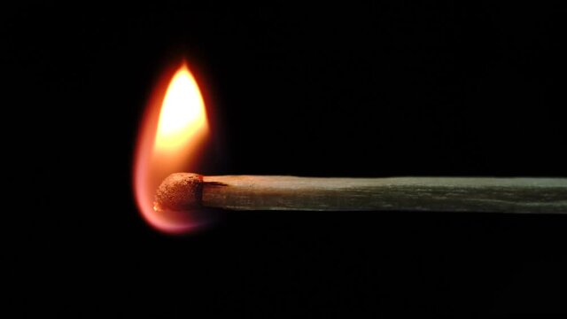 Slowmotion macro shots of matches being lit and running out creating different shapes.