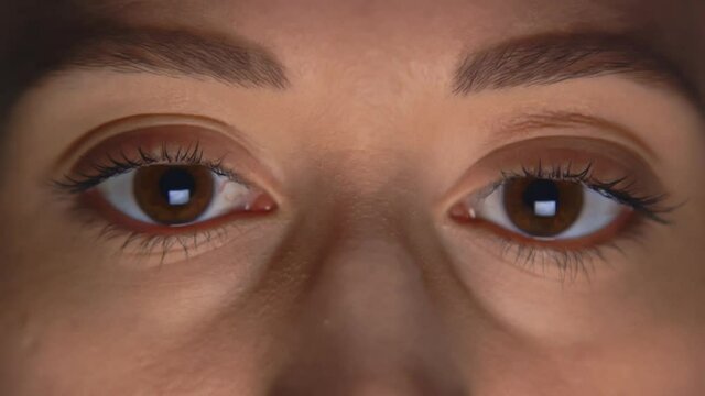 Caucasian female eyes staring off-camera, no blinking. We have more variations of the human eye, for more check out this seller's other videos.