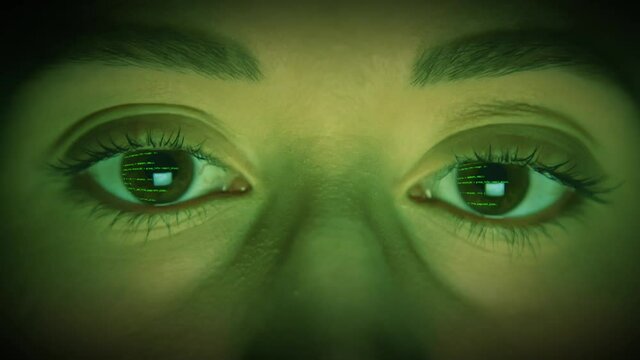 Caucasian female eyes, with green code scrolling, via reflection of a computer screen, no blinking. We also have more variations of the human eye, for more check out this seller's other videos.