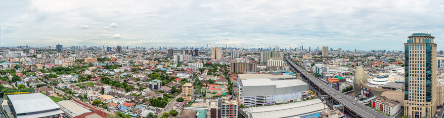 Fototapeta premium Bangkok panorama city view from high building. Bangkok skyline with local home, street and traffic.